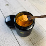 Organic turmeric and ginger extract, a powerful anti-inflammatory remedy for muscle recovery and overall well-being.